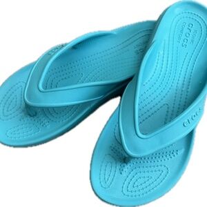 Turquoise Crocs Sandals